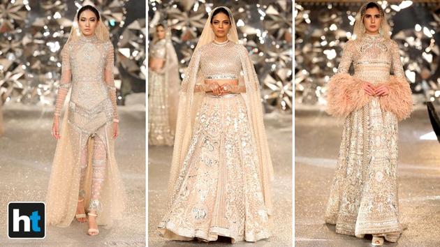 Falguni Shane Peacock’s collection saw some dazzling skirts, lehengas with long trains, a bodycon jumptsuit and gowns in shades of gold, silver, dust rose, cream and copper. (Raajessh Kashyap/HT Photo) Falguni Shane Peacock’s collection saw some dazzling skirts, lehengas with long trains, a bodycon jumptsuit and gowns in shades of gold, silver, dust rose, cream and copper. (Raajessh Kashyap/HT Photo)