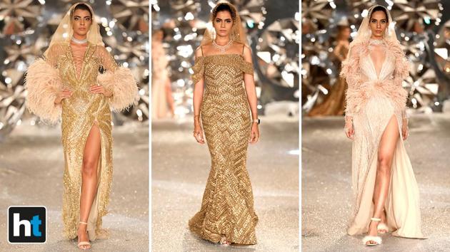 Some looks in their collection had a gold gown with applique work all over for a more traditional bride. (Raajessh Kashyap/HT Photo) Some looks in their collection had a gold gown with applique work all over for a more traditional bride. (Raajessh Kashyap/HT Photo)