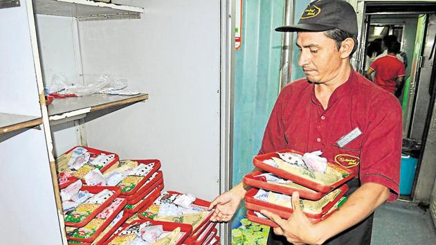 Like flight attendants, railway catering staff will now carry trash bags to collect waste from passengers in all trains after meals.(Karun Sharma/HT Photo)