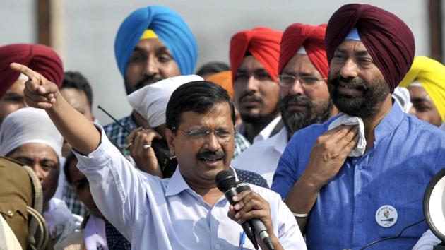 Delhi CM and AAP national convener Arvind Kejriwal with party MLA Sukhpal Singh Khaira at a rally in Gurdaspur district before 2017 assembly polls. (Ravi Kumar/HT) Delhi CM and AAP national convener Arvind Kejriwal with party MLA Sukhpal Singh Khaira at a rally in Gurdaspur district before 2017 assembly polls. (Ravi Kumar/HT)