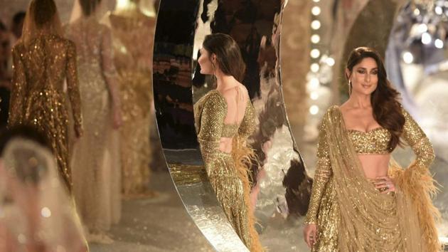 Bollywood actress Kareena Kapoor Khan walks the ramp for designer Falguni Shane Peacock during the India Couture Week in New Delhi on July 26, 2018. (Ravi Choudhary / PTI) Bollywood actress Kareena Kapoor Khan walks the ramp for designer Falguni Shane Peacock during the India Couture Week in New Delhi on July 26, 2018. (Ravi Choudhary / PTI)