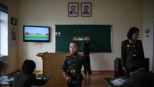 Students attend a class at the Kang Pan Sok Revolutionary School outside Pyongyang. This school is the sister school of the Mangyongdae Revolutionary School for boys, originally set up by the North’s founder Kim Il Sung to educate the orphans of those killed in the fight against Japanese colonial rule, it has evolved to become the country’s top school, and one of the institutions that knits the ruling elite together. (Ed Jones / AFP) Students attend a class at the Kang Pan Sok Revolutionary School outside Pyongyang. This school is the sister school of the Mangyongdae Revolutionary School for boys, originally set up by the North’s founder Kim Il Sung to educate the orphans of those killed in the fight against Japanese colonial rule, it has evolved to become the country’s top school, and one of the institutions that knits the ruling elite together. (Ed Jones / AFP)
