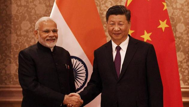 Prime Minister Narendra Modi with Chinese President Xi Jinping during a meeting on the sidelines of the BRICS summit in Johannesburg, South Africa, on Thursday. (PTI) Prime Minister Narendra Modi with Chinese President Xi Jinping during a meeting on the sidelines of the BRICS summit in Johannesburg, South Africa, on Thursday. (PTI)