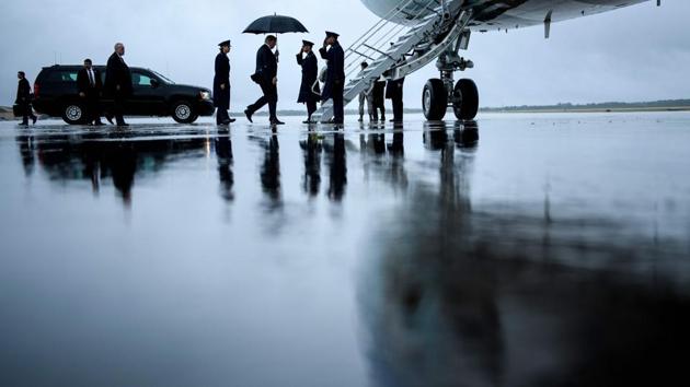 US President Donald Trump (C) boards Air Force One at Andrews Air Force Base, in Maryland on July 24, 2018. (Brendan Smialowski / AFP) US President Donald Trump (C) boards Air Force One at Andrews Air Force Base, in Maryland on July 24, 2018. (Brendan Smialowski / AFP)