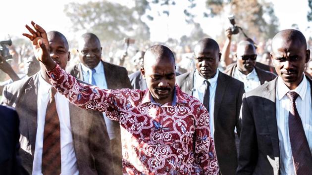 MDC-Alliance leader and opposition presidential candidate Nelson Chamisa greets supporters as he arrives at a campaign rally in Chitungwizea, outside Harare on July 26, 2018. (Marco Longari / AFP) MDC-Alliance leader and opposition presidential candidate Nelson Chamisa greets supporters as he arrives at a campaign rally in Chitungwizea, outside Harare on July 26, 2018. (Marco Longari / AFP)