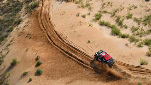 Mini Cooper Spanish pilot Nani Roma and Spanish co-pilot Alex Haro Bravo compete during the fifth leg of the Silk Way Rally 2018 Astrakhan-Volgograd on July 25, 2018. (Damien Meyer / AFP) Mini Cooper Spanish pilot Nani Roma and Spanish co-pilot Alex Haro Bravo compete during the fifth leg of the Silk Way Rally 2018 Astrakhan-Volgograd on July 25, 2018. (Damien Meyer / AFP)