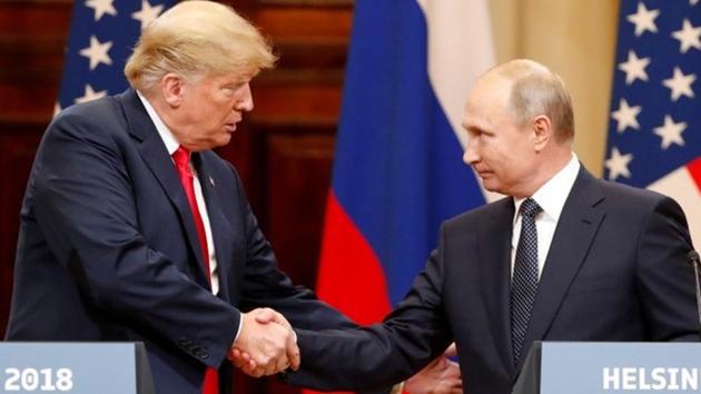 US President Donald Trump and Russian President Vladimir Putin shake hands as they hold a joint news conference after their meeting in Helsinki, Finland July 16, 2018. (Reuters File Photo) US President Donald Trump and Russian President Vladimir Putin shake hands as they hold a joint news conference after their meeting in Helsinki, Finland July 16, 2018. (Reuters File Photo)