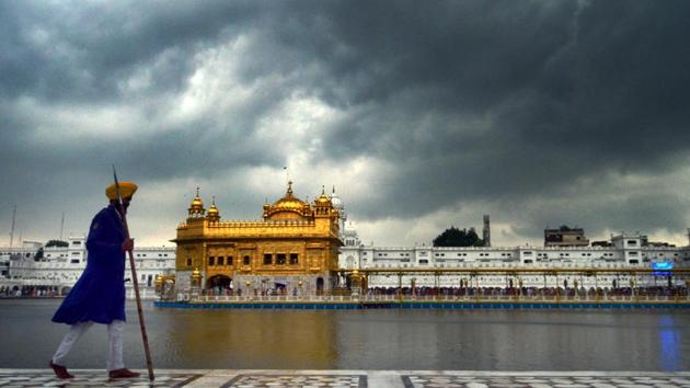 Golden Temple seen hovered with black clouds in Amritsar, Punjab on July 25, 2018. (Sameer Sehgal / HT Photo) Golden Temple seen hovered with black clouds in Amritsar, Punjab on July 25, 2018. (Sameer Sehgal / HT Photo)