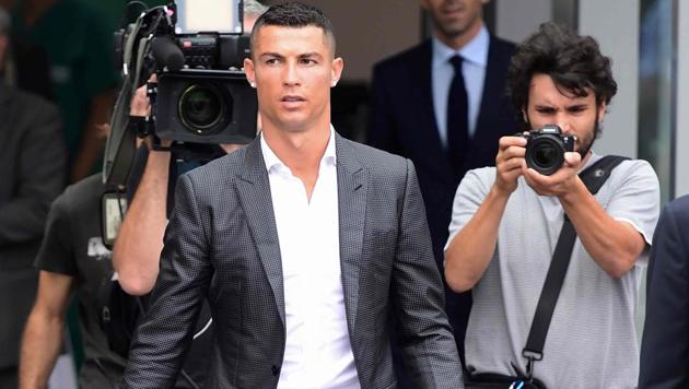 Portuguese footballer Cristiano Ronaldo arrives at the Juventus medical centre at the Alliance stadium in Turin.(AFP)