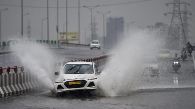 A car wades through a waterlogged road on NH-24 in New Delhi. The national capital recorded its second heaviest spell of monsoon rain this season, as the downpour that started on Thursday pounded the city through the night and into Friday before letting up at noon. Heavy rain also lashed other parts of the Delhi-NCR. (Ravi Choudhary / PTI) A car wades through a waterlogged road on NH-24 in New Delhi. The national capital recorded its second heaviest spell of monsoon rain this season, as the downpour that started on Thursday pounded the city through the night and into Friday before letting up at noon. Heavy rain also lashed other parts of the Delhi-NCR. (Ravi Choudhary / PTI)