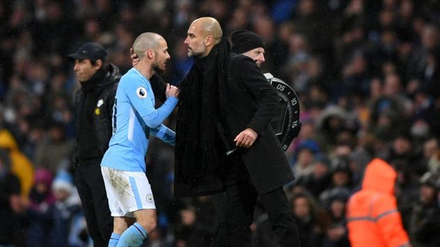 David Silva embraces Josep Guardiola, Manager of Manchester City during the Premier League match.(Getty Images)