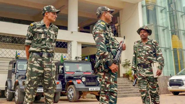 Security personnel guard in front of the NRC office at Bhangagarh in Guwahati on Sunday, July 29, 2018. The final draft of Assam's National Register of Citizens (NRC) will be published on 30th July, 2018.(PTI)