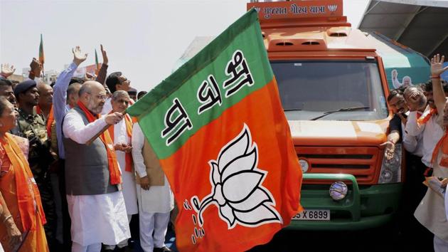 Bharatiya Janata Party President Amit Shah flags off “Gujarat Gaurav Yatra” ahead of forthcoming Assembly elections in Karamsad town of Anand district on Sunday. (PTI File Photo) Bharatiya Janata Party President Amit Shah flags off “Gujarat Gaurav Yatra” ahead of forthcoming Assembly elections in Karamsad town of Anand district on Sunday. (PTI File Photo)