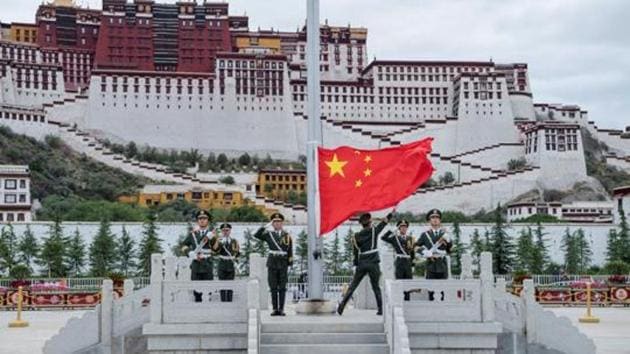 The Chinese national flag is raised during a ceremony at Potala Palace in Lhasa, Tibet Autonomous Region, China on July 1, 2017.(REUTERS) The Chinese national flag is raised during a ceremony at Potala Palace in Lhasa, Tibet Autonomous Region, China on July 1, 2017.(REUTERS)