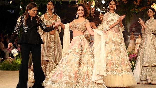 Yami’s super-pretty, whimsical floral lehenga actually resembled a chic, grown-up version of a fantasy princess. (Jasjeet plaha/HT Photo) Yami’s super-pretty, whimsical floral lehenga actually resembled a chic, grown-up version of a fantasy princess. (Jasjeet plaha/HT Photo)
