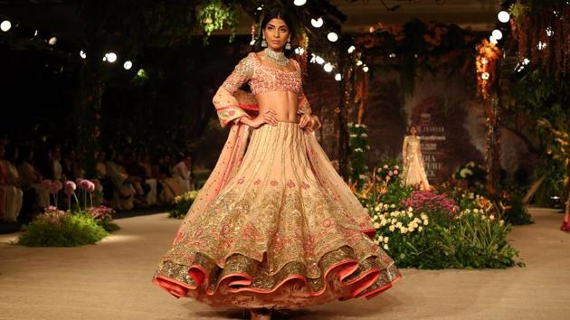 The theme came through in a range of textures, patterns and embellishments adorned on a series of familiar wedding and bridal silhouettes, namely lehengas. (Jasjeet plaha/HT Photo) The theme came through in a range of textures, patterns and embellishments adorned on a series of familiar wedding and bridal silhouettes, namely lehengas. (Jasjeet plaha/HT Photo)