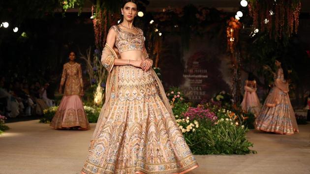 “The collection is all about the blending of pastel tones and tender flora elements, and have been designed considering modern brides who don’t want to do the same thing the whole world is doing. This time I have used chanderi in a different, a younger way because young girls like to wear less weight, there’s also net and lace. My lehengas are not for one time use, you can wear them 20 years later — they’re forever,” Taandon said before her show. (Jasjeet plaha/HT Photo) “The collection is all about the blending of pastel tones and tender flora elements, and have been designed considering modern brides who don’t want to do the same thing the whole world is doing. This time I have used chanderi in a different, a younger way because young girls like to wear less weight, there’s also net and lace. My lehengas are not for one time use, you can wear them 20 years later — they’re forever,” Taandon said before her show. (Jasjeet plaha/HT Photo)