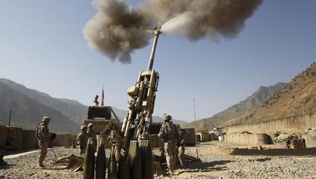 US soldiers from Charlie Battery, 321st Field Artillery Regiment fire a 155MM M777 howitzer at a Taliban enemy position from Forward Operating Base (FOB) Bostic, in Kunar province, eastern Afghanistan September 28, 2011. India is testing these guns at Pokhran and will acquire 145 Howitzers from the US in the next three years.(REUTERS File Photo) US soldiers from Charlie Battery, 321st Field Artillery Regiment fire a 155MM M777 howitzer at a Taliban enemy position from Forward Operating Base (FOB) Bostic, in Kunar province, eastern Afghanistan September 28, 2011. India is testing these guns at Pokhran and will acquire 145 Howitzers from the US in the next three years.(REUTERS File Photo)