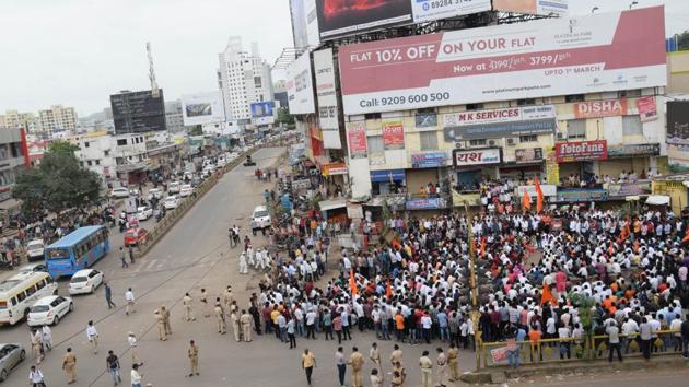 Police use tear gas to quell violent Maratha protests in western ...
