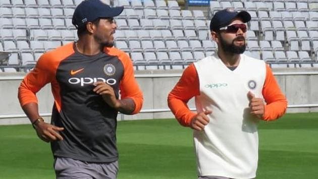Virat Kohli (R) and Umesh Yadav practice ahead of India’s first Test against England. (BCCI)