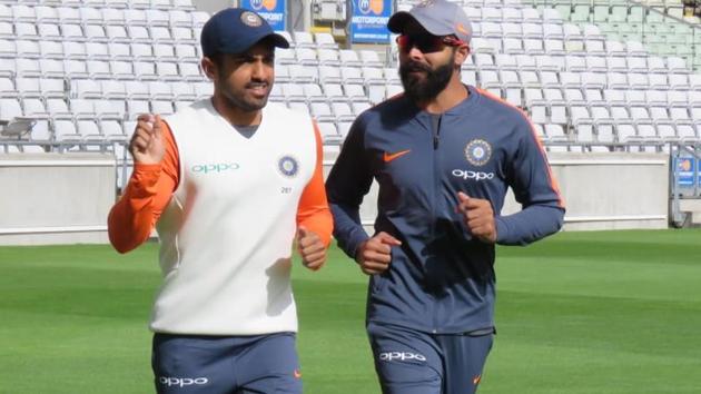 Karun Nair (L) and Ravindra Jadeja chat during the practice session. (BCCI) 