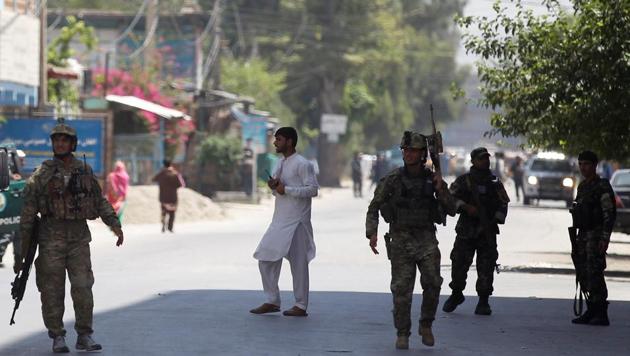 Afghan security forces arrive at an area where explosions and gunshots were heard, in Jalalabad city, Afghanistan on July 31. (REUTERS) Afghan security forces arrive at an area where explosions and gunshots were heard, in Jalalabad city, Afghanistan on July 31. (REUTERS)