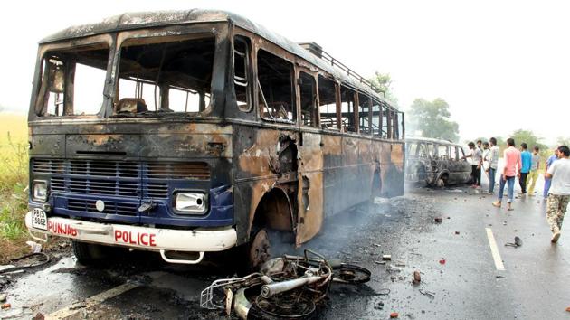 A torched police vehicle during a protest at Behbal Kalan village in Faridkot. (HT File) A torched police vehicle during a protest at Behbal Kalan village in Faridkot. (HT File)