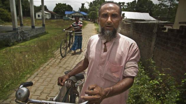 Abdul Manan, a Muslim man returns after finding that his name is not included in the National Register of Citizens draft in Mayoung. (Anupam Nath / AP)