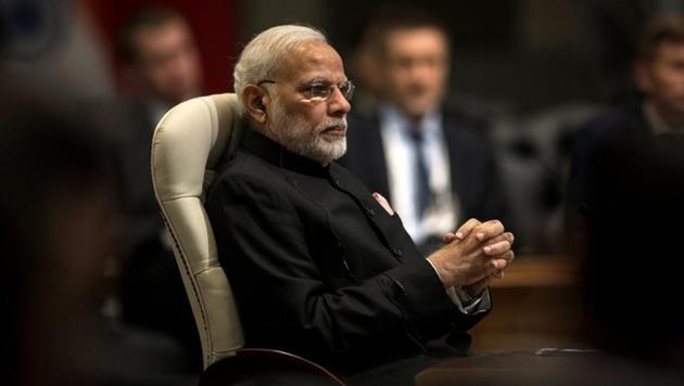 Prime Minister Narendra Modi looks on during the BRICS Summit in Johannesburg, South Africa.(Reuters Photo)