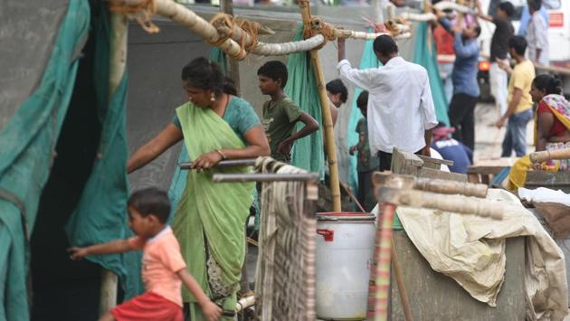 Residents relocated to higher grounds said that the tents set up by the government are already overcrowded. “To use toilet we have to walk over a kilometer where the mobile toilets are stationed. Also, there is no proper arrangement for drinking water and food,” said an evacuee. Many are waiting for the water level in the river to come down so that they can check their submerged farm land-- their only source of income. (Raj K Raj / HT Photo) Residents relocated to higher grounds said that the tents set up by the government are already overcrowded. “To use toilet we have to walk over a kilometer where the mobile toilets are stationed. Also, there is no proper arrangement for drinking water and food,” said an evacuee. Many are waiting for the water level in the river to come down so that they can check their submerged farm land-- their only source of income. (Raj K Raj / HT Photo)