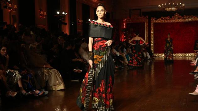 Black-on-black and white-on-white worked best for showcasing the designer’s penchant for symmetry and angular forms and one saw exquisitely rendered variations on delicate otherworldliness and tulles gloriously embellished. (Amal KS/HT Photo ) 