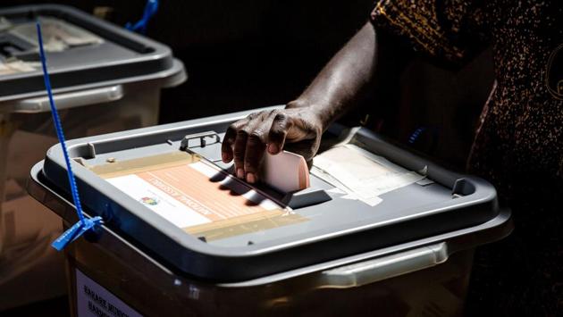 A man casts his ballot in a polling station located in the suburb of Mbare in Zimbabwe's capital Harare. Voting appeared to pass off largely without incident despite the UN High Commissioner for Human Rights warning of intimidation and threats of violence in the run-up to polling day. (Luis Tato / AFP) A man casts his ballot in a polling station located in the suburb of Mbare in Zimbabwe's capital Harare. Voting appeared to pass off largely without incident despite the UN High Commissioner for Human Rights warning of intimidation and threats of violence in the run-up to polling day. (Luis Tato / AFP)