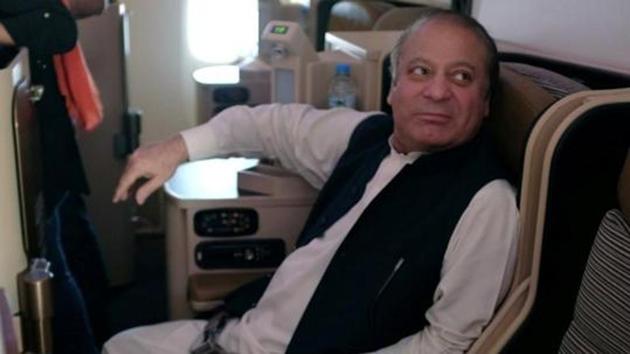 Ousted Pakistani Prime Minister Nawaz Sharif sits on a plane after landing at the Allama Iqbal International Airport in Lahore, Pakistan, July 13, 2018.(REUTERS File Photo)