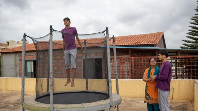 A specially abled person on a trampoline at ALFAA (Assisted Living for Autistic Adults), in Bengaluru. Ruby Singh, the mother of an autistic man, runs the ALFAA trust and daycare centre which cares for 22 specially abled people aged 14 to 29, with the help of 14 special educators and caretakers. In five years, Ruby hopes to have a residential facility up and running too. (Vivek M / HT Photo) A specially abled person on a trampoline at ALFAA (Assisted Living for Autistic Adults), in Bengaluru. Ruby Singh, the mother of an autistic man, runs the ALFAA trust and daycare centre which cares for 22 specially abled people aged 14 to 29, with the help of 14 special educators and caretakers. In five years, Ruby hopes to have a residential facility up and running too. (Vivek M / HT Photo)