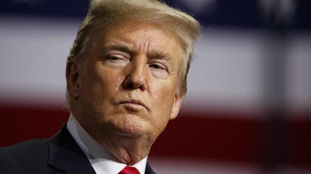 President Donald Trump listens during a campaign rally at Florida State Fairgrounds Expo Hall, Tuesday, July 31, 2018, in Tampa, Fla. (AP) President Donald Trump listens during a campaign rally at Florida State Fairgrounds Expo Hall, Tuesday, July 31, 2018, in Tampa, Fla. (AP)
