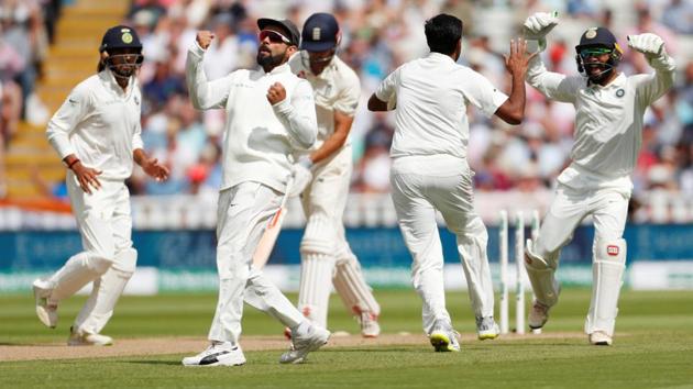 Virat Kohli celebrates after Ravichandran Ashwin bowled out England's Alastair Cook during the first day of the test match at Edgbaston, Birmingham on Wednesday. (Andrew Boyers / Reuters) Virat Kohli celebrates after Ravichandran Ashwin bowled out England's Alastair Cook during the first day of the test match at Edgbaston, Birmingham on Wednesday. (Andrew Boyers / Reuters)
