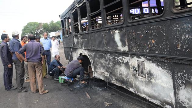 Pune Mahanagar Parivahan Mahamandal Limited employees undertaking repair works of a bus after 10 buses were torched in Maratha protest on Tuesday. (HT PHOTO) Pune Mahanagar Parivahan Mahamandal Limited employees undertaking repair works of a bus after 10 buses were torched in Maratha protest on Tuesday. (HT PHOTO)