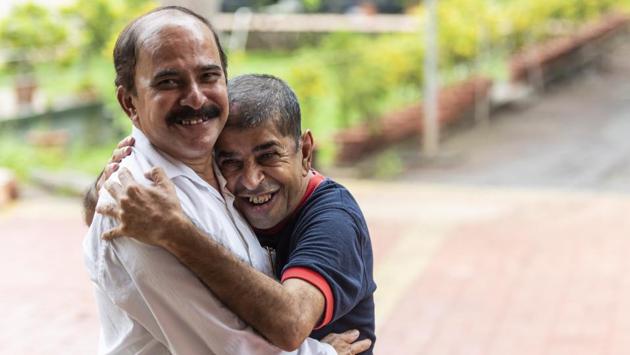 Vishwas Gore (L), 57, runs the 5-acre Adhar facility in Badlapur, set up in 1994 by a trust made up of parents. It houses 220 people aged 18 to 75. Dr Nimesh Desai, director of the Institute of Human Behaviour and Allied Sciences (IHBAS), Delhi says it’s a welcome step for parents’ associations to start such homes but the shift to semi-formal or formal models must adhere to some minimum standards set by the government. (Aalok Soni / HT Photo) 