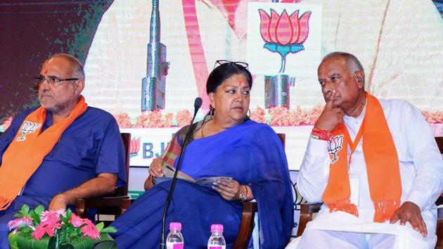 Rajasthan chief minister Vasundhara Raje and BJP leader Madanlal Saini attends a working committee meeting in Jaipur. (PTI File Photo) Rajasthan chief minister Vasundhara Raje and BJP leader Madanlal Saini attends a working committee meeting in Jaipur. (PTI File Photo)