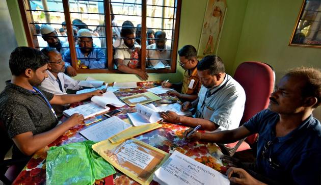 People wait to check their names on the draft list at the National Register of Citizens centre at a village in Nagaon district, Assam. (Reuters file photo) People wait to check their names on the draft list at the National Register of Citizens centre at a village in Nagaon district, Assam. (Reuters file photo)