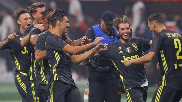 Mattia De Sciglio #2 of Juventus is congratulated after scoring the fifth penalty shot to give Juventus a 5-4 penalty shootout win over the MLS All-Stars during the 2018 MLS All-Star Game at Mercedes-Benz Stadium on August 1, 2018 in Atlanta. (AFP) Mattia De Sciglio #2 of Juventus is congratulated after scoring the fifth penalty shot to give Juventus a 5-4 penalty shootout win over the MLS All-Stars during the 2018 MLS All-Star Game at Mercedes-Benz Stadium on August 1, 2018 in Atlanta. (AFP)