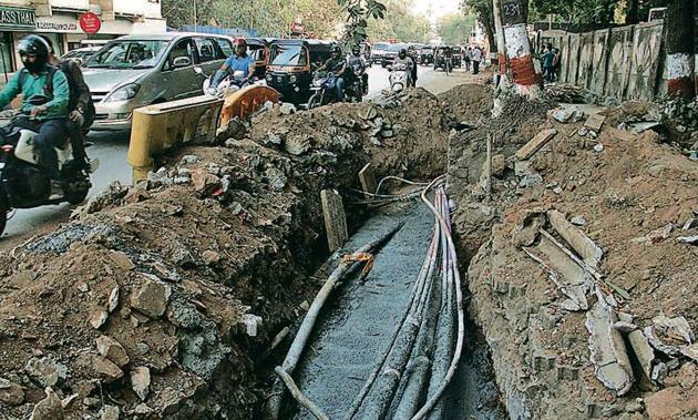 Utility work commonly causes traffic jams in different parts of the city throughout the year. (HT File Photo) Utility work commonly causes traffic jams in different parts of the city throughout the year. (HT File Photo)