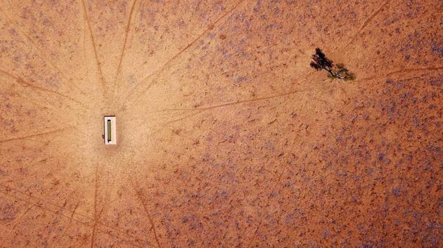 A lone tree stands near a water trough in a drought-affected paddock on Jimmie and May McKeown’s property located on the outskirts of Walgett, in New South Wales, Australia. At ground level, Australia’s drought looks like a featureless, brown dust bowl, but from the air it transforms into an artistry of colour and texture as the land cracks under a blazing sun. (David Gray / REUTERS) A lone tree stands near a water trough in a drought-affected paddock on Jimmie and May McKeown’s property located on the outskirts of Walgett, in New South Wales, Australia. At ground level, Australia’s drought looks like a featureless, brown dust bowl, but from the air it transforms into an artistry of colour and texture as the land cracks under a blazing sun. (David Gray / REUTERS)