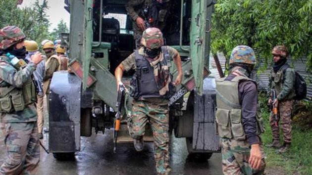 Security personnel outside the house which was held up by alleged militants during an encounter in Kupwara district. (PTI File Photo) Security personnel outside the house which was held up by alleged militants during an encounter in Kupwara district. (PTI File Photo)