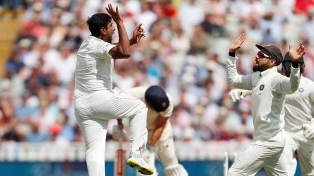 India’s Ravichandran Ashwin celebrates with Virat Kohli after taking the wicket of England's Alastair Cook (Action Images via Reuters)