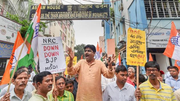 Congress party leaders raise slogans during a protest against controversial Assam's National Register of Citizen (NRC) draft in front of Assam House, in Kolkata on Thursday, Aug 2, 2018. (PTI Photo/Swapan Mahapatra) (PTI8_2_2018_000086B) (PTI) Congress party leaders raise slogans during a protest against controversial Assam's National Register of Citizen (NRC) draft in front of Assam House, in Kolkata on Thursday, Aug 2, 2018. (PTI Photo/Swapan Mahapatra) (PTI8_2_2018_000086B) (PTI)