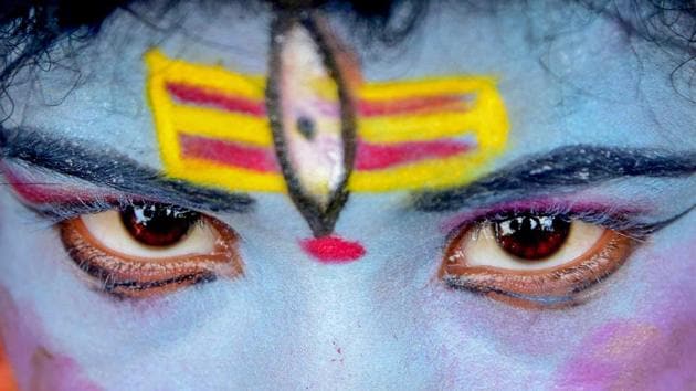 A child dressed as Hindu deity Shiva poses for a photo outside a temple on the first Monday of the holy month of ‘Shravan’ in Allahabad, Uttar Pradesh on July 30, 2018. (PTI) A child dressed as Hindu deity Shiva poses for a photo outside a temple on the first Monday of the holy month of ‘Shravan’ in Allahabad, Uttar Pradesh on July 30, 2018. (PTI)