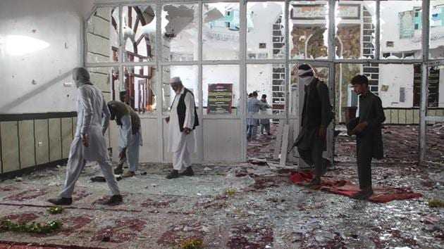 Afghan residents walk inside a damaged mosque after a suicide attack during Friday prayers in Gardez of Paktia province on August 3, 2018.(AFP) Afghan residents walk inside a damaged mosque after a suicide attack during Friday prayers in Gardez of Paktia province on August 3, 2018.(AFP)