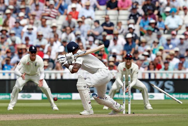 India's KL Rahul (C) is bowled by England's Sam Curran on the second day of the first Test cricket match between England and India at Edgbaston. (AFP)