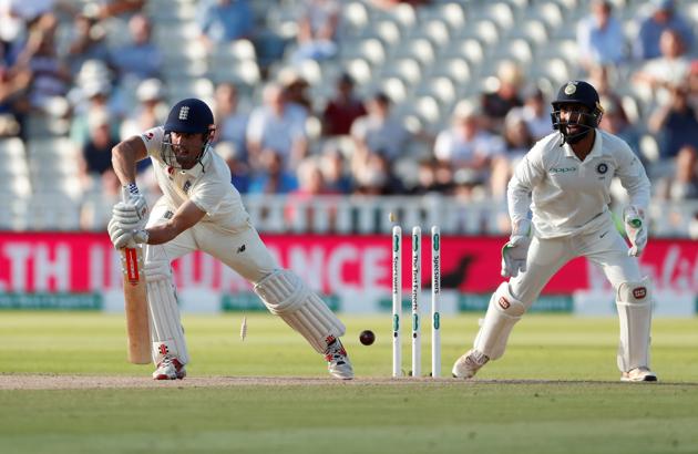 England's Alastair Cook is bowled out by India's Ravichandran Ashwin. (REUTERS)